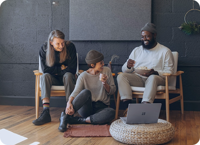 Colleagues having a conversation in a collaborative workspace